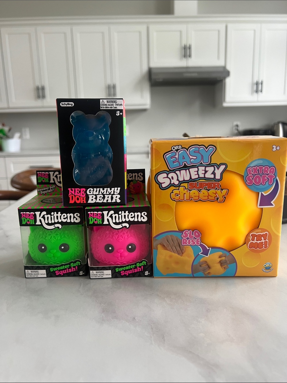 Bundle of 4, authentic NeeDoh Knittens & gummy bear, orb easy Sqweezy cheese,